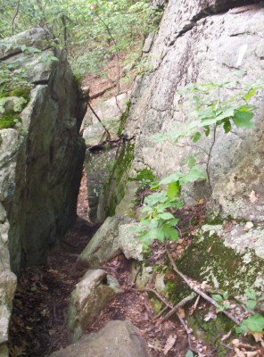 A narrow walk between boulders