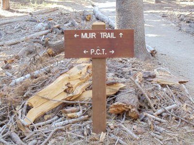 Trail sign: Muir Trail to left and straight ahead, Pacific Crest to left and to right
