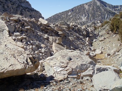 A small boulder-strewn depression just adjacent to the trail; the granite blocks remind me of toy blocks
